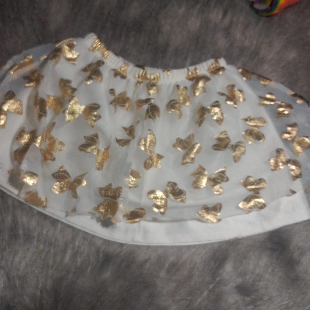 Girls bow print ivory & gold metallic pattern lined skirt